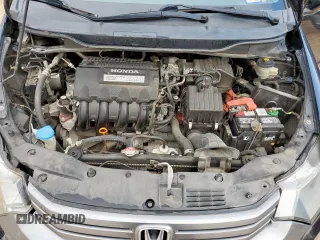 2010 Honda Insight EX z VIN JHMZE2H72AS038002, wystawiony jako Copart lot #58484365 z przebiegiem 178 670 mil mil oraz Szkoda całkowita • Salvage title. Historia ofert i sprzedaży dostępna na DreamBid. Obrazek 11.