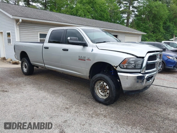 2013 Ram 2500 SLT z VIN 3C6UR5JL9DG571444, wystawiony jako IAAI lot #42210589 z przebiegiem 143 029 mil mil oraz . Historia ofert i sprzedaży dostępna na DreamBid. Obrazek 1.
