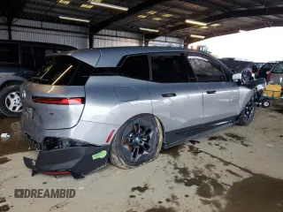 2023 BMW iX xDrive50 with VIN WB523CF05PCM22164, listed as a Copart auction lot 81196264 with 0 mi miles and Salvage Title. Bid and sale history available at carsss.com. Image 3.