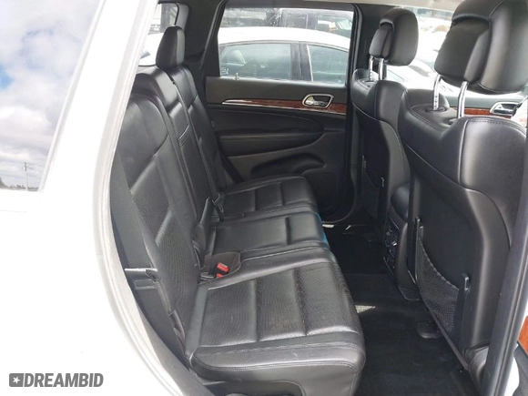 2013 Jeep Grand Cherokee Limited with VIN 1C4RJFBT0DC619216, listed as a IAAI auction lot 41703137 with 142,577 mi miles. Bid and sale history available at carsss.com. Image 8.