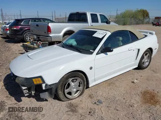 2004 Ford Mustang Deluxe with VIN 1FAFP44674F134492, listed as a IAAI auction lot 42562080 with 145,600 mi miles and . Bid and sale history available at DreamBid. Image 2.