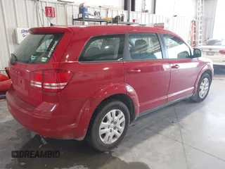 2013 Dodge Journey SE with VIN 3C4PDCAB7DT680122, listed as a IAAI auction lot 42332162 with 224,506 mi miles and . Bid and sale history available at DreamBid. Image 4.