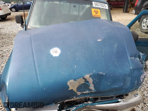 1993 Ford Ranger Splash with VIN 1FTCR10A2PUD69950, listed as a Copart auction lot 56270525 with 65,731 mi miles and Salvage title. Bid and sale history available at DreamBid. Image 11.