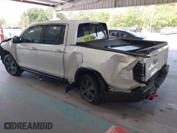 2020 Honda Ridgeline RTL-E with VIN 5FPYK3F71LB005028, listed as a IAAI auction lot 42167883 with 81,882 mi miles and . Bid and sale history available at DreamBid. Image 3.