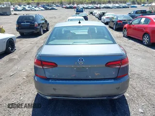 2021 Volkswagen Passat SE with VIN 1VWSA7A39MC011507, listed as a IAAI auction lot 42160879 with 82,639 mi miles and . Bid and sale history available at DreamBid. Image 16.