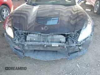 2014 Chevrolet Corvette Z51 3LT with VIN 1G1YL2D70E5104908, listed as a IAAI auction lot 41382006 with 133,341 mi miles and . Bid and sale history available at DreamBid. Image 6.