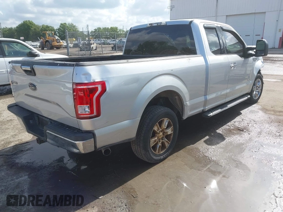 2015 Ford F-150 XL with VIN 1FTEX1CP1FKE81373, listed as a IAAI auction lot 42176024 with 186,808 mi miles. Bid and sale history available at carsss.com. Image 4.