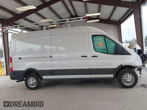 2024 Ford Transit Cargo with VIN 1FTBR2C82RKA94637, listed as a IAAI auction lot 41829528 with 16,901 mi miles and . Bid and sale history available at DreamBid. Image 13.