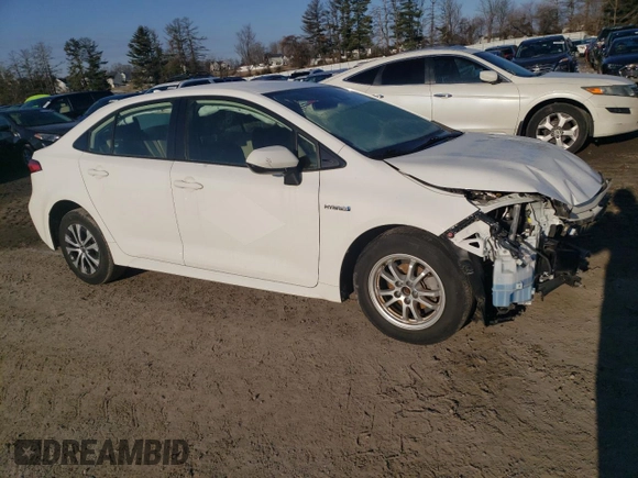2021 Toyota Corolla Hybrid LE with VIN JTDEAMDE5MJ011169, listed as a Copart auction lot 88752265 with 52,994 mi miles and Salvage Title. Bid and sale history available at carsss.com. Image 4.