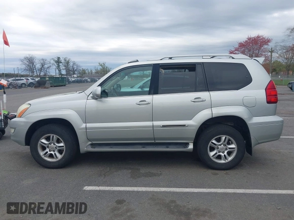 2004 Lexus GX with VIN JTJBT20X240063922, listed as a IAAI auction lot 42087170 with 251,366 mi miles. Bid and sale history available at carsss.com. Image 14.