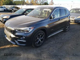 2016 BMW X1 xDrive28i with VIN WBXHT3C30GP881353, listed as a Copart auction lot 65233532 with 52,036 mi miles. Bid and sale history available at carsss.com. Image 2.