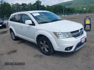 2012 Dodge Journey SXT with VIN 3C4PDDBG3CT307500, listed as a IAAI auction lot 42728446 with 122,072 mi miles and . Bid and sale history available at DreamBid. Image 1.