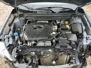 2025 Mazda CX-5 S Carbon Edition z VIN JM3KFBCMXS0683398, wystawiony jako Copart lot #81329585 z przebiegiem 6 041 mil mil oraz Czysty tytuł • Clean title. Historia ofert i sprzedaży dostępna na DreamBid. Obrazek 14.