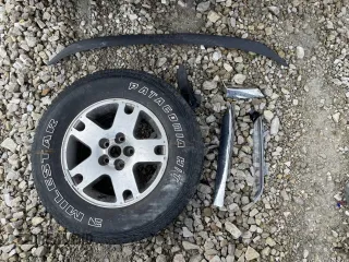 2005 Ford Escape Limited with VIN 1FMYU94145KE17773, listed as a Copart auction lot 60451635 with 181,098 mi miles and Salvage title. Bid and sale history available at DreamBid. Image 13.