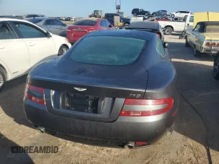 2005 Aston Martin DB9 z VIN SCFAD01A75GA02198, wystawiony jako Copart lot #75564554 z przebiegiem Nie podano mil oraz Nie do naprawy • Non repairable. Historia ofert i sprzedaży dostępna na DreamBid. Obrazek 6.