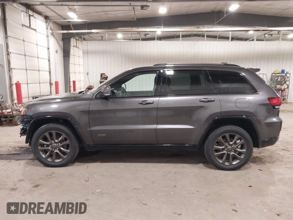 2016 Jeep Grand Cherokee Limited 75th Anniversary with VIN 1C4RJFBG2GC349154, listed as a IAAI auction lot 41392239 with 135,627 mi miles and . Bid and sale history available at DreamBid. Image 14.
