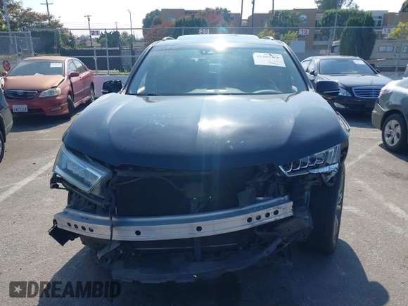 2019 Acura MDX Advance with VIN 5J8YD3H89KL001475, listed as a IAAI auction lot 42489400 with 100,281 mi miles and . Bid and sale history available at DreamBid. Image 13.