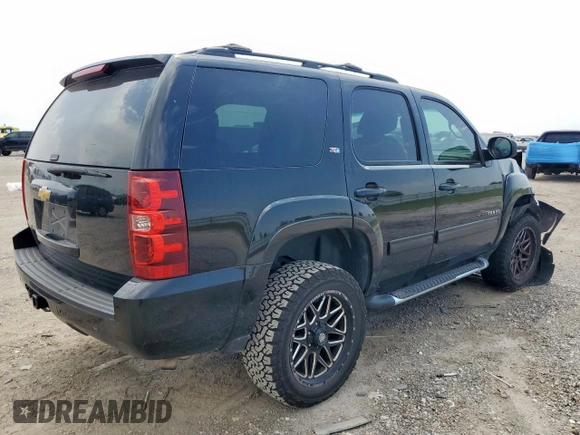2013 Chevrolet Tahoe LT with VIN 1GNSKBE0XDR132697, listed as a Copart auction lot 57252575 with 166,956 mi miles and Salvage title. Bid and sale history available at DreamBid. Image 3.