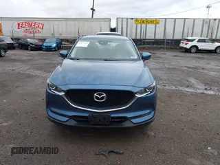 2019 Mazda CX-5 Sport with VIN JM3KFBBM5K0668678, listed as a IAAI auction lot 41811146 with 102,634 mi miles and . Bid and sale history available at DreamBid. Image 12.