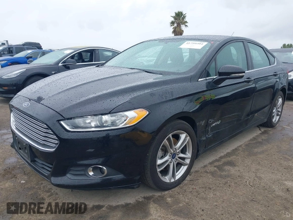 2016 Ford Fusion SE Hybrid with VIN 3FA6P0LU5GR356433, listed as a IAAI auction lot 41799204 with 157,670 mi miles. Bid and sale history available at carsss.com. Image 17.