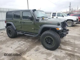 2021 Jeep Wrangler Unlimited Willys with VIN 1C4HJXDG2MW563201, listed as a Copart auction lot 50156305 with 33,372 mi miles and Salvage title. Bid and sale history available at DreamBid. Image 4.