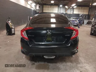 2019 Honda Civic Sport with VIN 2HGFC2F84KH590469, listed as a IAAI auction lot 41686757 with 79,602 mi miles and . Bid and sale history available at DreamBid. Image 17.