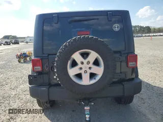 2014 Jeep Wrangler Sport with VIN 1C4AJWAG4EL233014, listed as a Copart auction lot 49868955 with 190,623 mi miles and Salvage Title. Bid and sale history available at carsss.com. Image 6.
