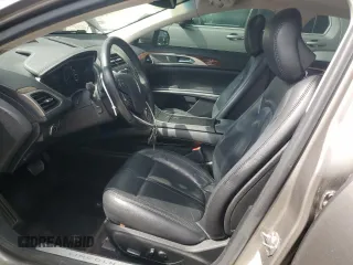2015 Lincoln MKZ z VIN 3LN6L2G9XFR611837, wystawiony jako Copart lot #55038635 z przebiegiem 133 596 mil mil oraz Szkoda całkowita • Salvage title. Historia ofert i sprzedaży dostępna na DreamBid. Obrazek 7.