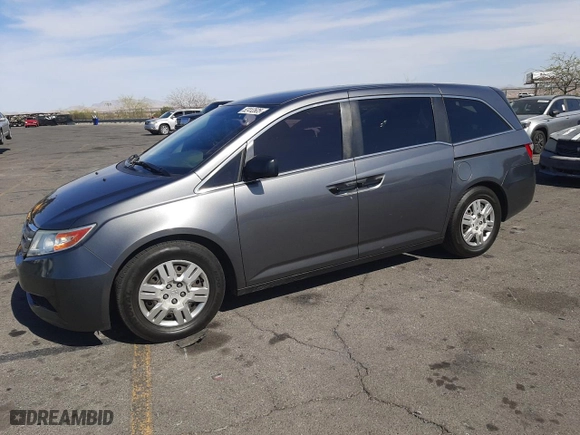 2012 Honda Odyssey LX with VIN 5FNRL5H24CB019934, listed as a Copart auction lot 52412605 with 157,725 mi miles and Salvage Title. Bid and sale history available at carsss.com. Image 1.