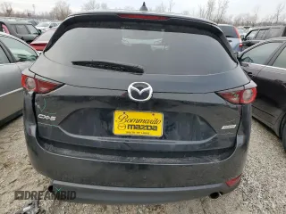 2018 Mazda CX-5 Touring z VIN JM3KFACM9J0300642, wystawiony jako Copart lot #80210854 z przebiegiem 118 309 mil mil oraz Szkoda całkowita • Salvage title. Historia ofert i sprzedaży dostępna na DreamBid. Obrazek 6.