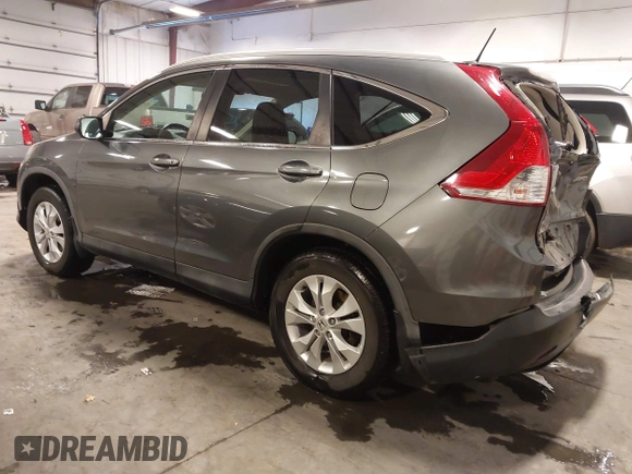 2014 Honda CR-V EX-L with VIN 5J6RM4H76EL043214, listed as a IAAI auction lot 41579664 with 124,681 mi miles. Bid and sale history available at carsss.com. Image 3.