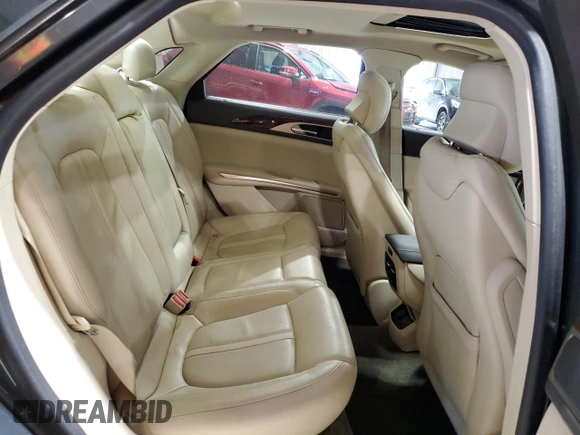 2015 Lincoln MKZ z VIN 3LN6L2J95FR613519, wystawiony jako Copart lot #59165895 z przebiegiem 117 630 mil mil oraz Szkoda całkowita • Salvage title. Historia ofert i sprzedaży dostępna na DreamBid. Obrazek 10.
