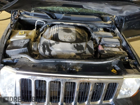 2010 Jeep Commander Sport with VIN 1J4RG4GT7AC113206, listed as a Copart auction lot 56103825 with 174,306 mi miles and Salvage title. Bid and sale history available at DreamBid. Image 12.