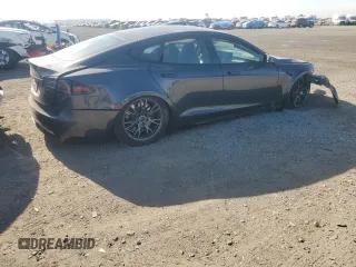 2024 Tesla Model S z VIN 5YJSA1E57RF545269, wystawiony jako Copart lot #87419784 z przebiegiem Nie podano mil oraz Szkoda całkowita • Salvage title. Historia ofert i sprzedaży dostępna na DreamBid. Obrazek 3.