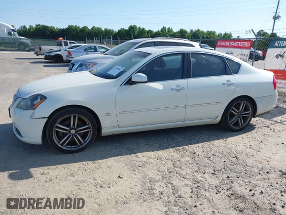 2006 Infiniti M z VIN JNKAY01E46M110394, wystawiony jako IAAI lot #42309941 z przebiegiem 140 240 mil mil oraz . Historia ofert i sprzedaży dostępna na DreamBid. Obrazek 16.