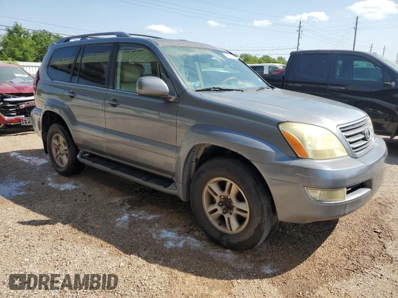 2004 Lexus GX 470 with VIN JTJBT20X640036996, listed as a Copart auction lot 52986205 with 218,217 mi miles and Clean Title. Bid and sale history available at DreamBid. Image 4.