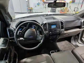 2015 Ford F-150 XLT with VIN 1FTEW1EG3FFA90167, listed as a IAAI auction lot 42792760 with 142,559 mi miles and . Bid and sale history available at DreamBid. Image 4.