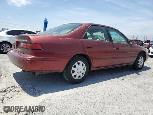 1999 Toyota Camry LE z VIN JT2BG22K6X0274398, wystawiony jako Copart lot #57263795 z przebiegiem 202 944 mil mil oraz Szkoda całkowita • Salvage title. Historia ofert i sprzedaży dostępna na DreamBid. Obrazek 3.