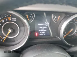 2020 Jeep Gladiator Sport S z VIN 1C6HJTAG6LL160925, wystawiony jako Copart lot #56888555 z przebiegiem 64 017 mil mil oraz Szkoda całkowita • Salvage title. Historia ofert i sprzedaży dostępna na DreamBid. Obrazek 9.