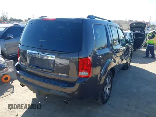 2015 Honda Pilot Touring with VIN 5FNYF3H94FB002236, listed as a IAAI auction lot 41735221 with 112,766 mi miles. Bid and sale history available at carsss.com. Image 4.