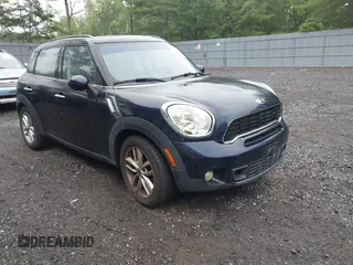 2011 MINI Countryman S z VIN WMWZC3C55BWL79422, wystawiony jako IAAI lot #42466982 z przebiegiem 104 392 mil mil oraz . Historia ofert i sprzedaży dostępna na DreamBid. Obrazek 1.