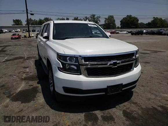 2019 Chevrolet Suburban LT with VIN 1GNSCHKCXKR207233, listed as a Copart auction lot 55410464 with 107,500 mi miles and Salvage Title. Bid and sale history available at DreamBid. Image 11.