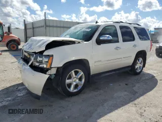 2012 Chevrolet Tahoe LTZ z VIN 1GNSCCE08CR214560, wystawiony jako Copart lot #44723175 z przebiegiem 137 489 mil mil oraz Szkoda całkowita • Salvage title. Historia ofert i sprzedaży dostępna na DreamBid. Obrazek 1.