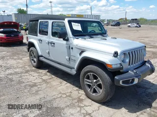 2023 Jeep Wrangler High Altitude with VIN 1C4HJXEN9PW634797, listed as a IAAI auction lot 42216589 with 27,053 mi miles and . Bid and sale history available at DreamBid. Image 1.