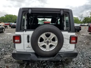 2019 Jeep Wrangler Sport S with VIN 1C4GJXAG0KW608696, listed as a Copart auction lot 57963455 with 51,955 mi miles and Salvage title. Bid and sale history available at DreamBid. Image 6.