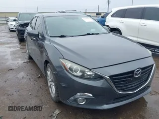 2016 Mazda 3 S Touring with VIN JM1BM1M31G1297260, listed as a IAAI auction lot 41460777 with 94,425 mi miles and . Bid and sale history available at DreamBid. Image 1.
