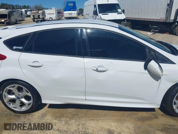 2014 Ford Focus ST with VIN 1FADP3L99EL311771, listed as a IAAI auction lot 41419521 with 124,572 mi miles and . Bid and sale history available at carsss.com. Image 14.