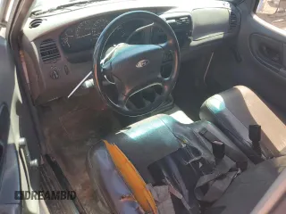 2001 Ford Ranger XL z VIN 1FTYR10D71PB77672, wystawiony jako Copart lot #56221145 z przebiegiem 267 375 mil mil oraz Nie do naprawy • Non repairable. Historia ofert i sprzedaży dostępna na DreamBid. Obrazek 8.
