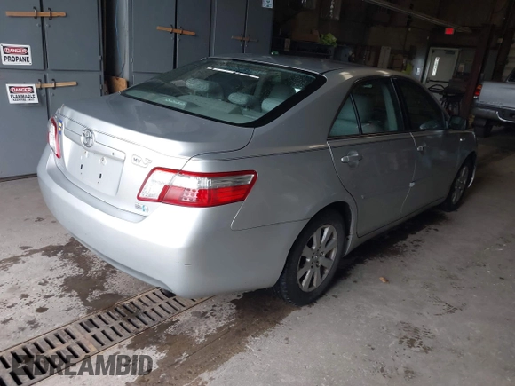 2007 Toyota Camry z VIN JTNBB46K973038138, wystawiony jako IAAI lot #42233680 z przebiegiem 230 480 mil mil oraz . Historia ofert i sprzedaży dostępna na DreamBid. Obrazek 4.