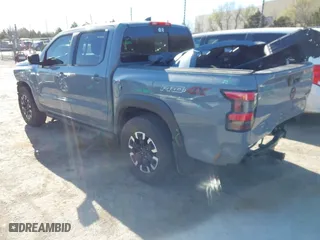2023 Nissan Frontier PRO-4X with VIN 1N6ED1EK7PN670665, listed as a IAAI auction lot 41785130 with 21,561 mi miles. Bid and sale history available at carsss.com. Image 3.